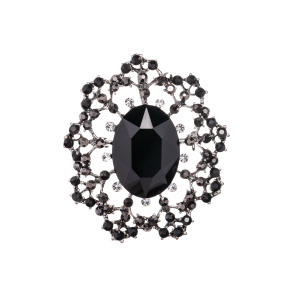 Brooch with sparkling glass stone